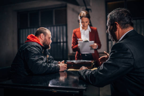 lawyer sitting in the investigation room